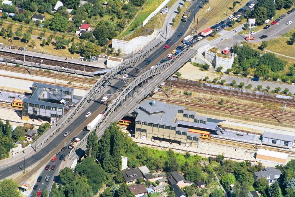 Berlin from the bird's eye view: The bridge Bornholmerbruecke spans the train tracks at the Bornholmer-Strasse S-Bahn station between the city districts of Berlin-Prenzlauer Berg and Berlin-Wedding. In rush hour, it depends on the bridge often long traffic jam