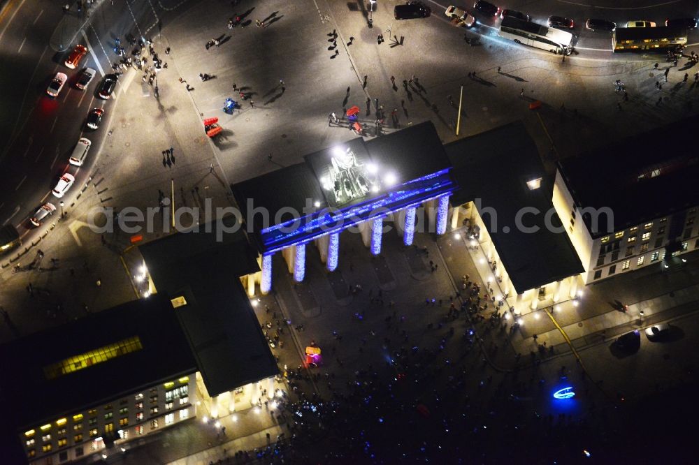 Aerial photograph Berlin - Night Shot: The Brandenburg Gate at the square Pariser Platz with illumination at the Festival of Lights. Warning: Commercial use on prior request only