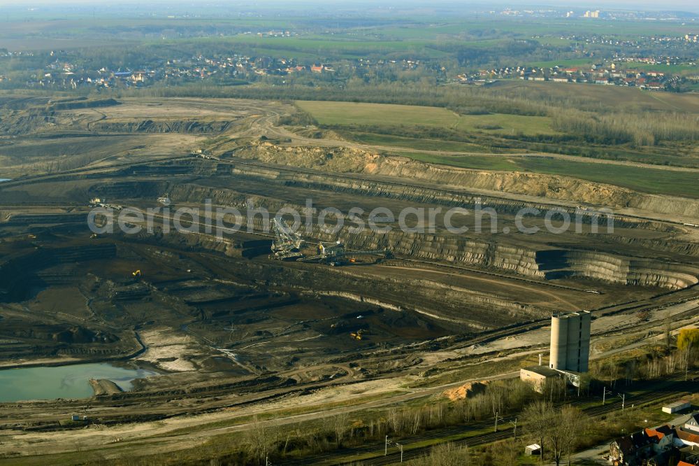 Amsdorf from the bird's eye view: Mining area - terrain and overburden surfaces of coal - opencast mining of ROMONTA Bergwerks Holding AG on Chausseestrasse in Seegebiet Mansfelder Land in the state Saxony-Anhalt, Germany