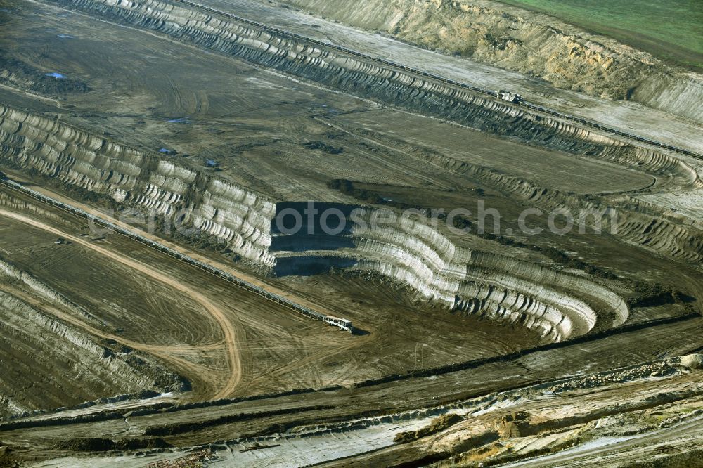 Aerial image Amsdorf - Mining area - terrain and overburden surfaces of coal - opencast mining of ROMONTA Bergwerks Holding AG on Chausseestrasse in Seegebiet Mansfelder Land in the state Saxony-Anhalt, Germany