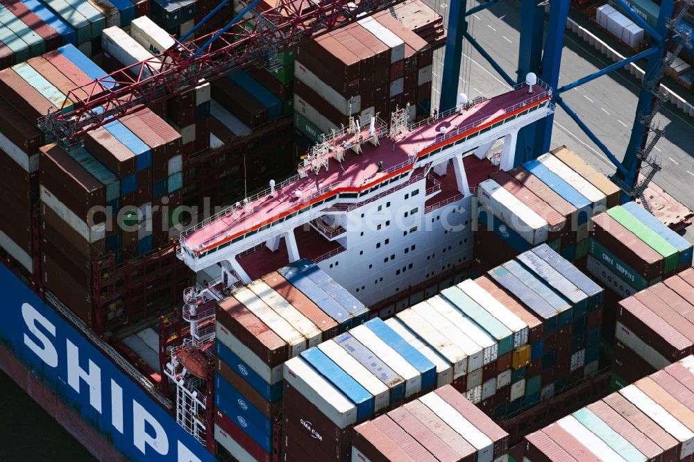 Aerial image Hamburg - Container ship in the port in Hamburg, Germany