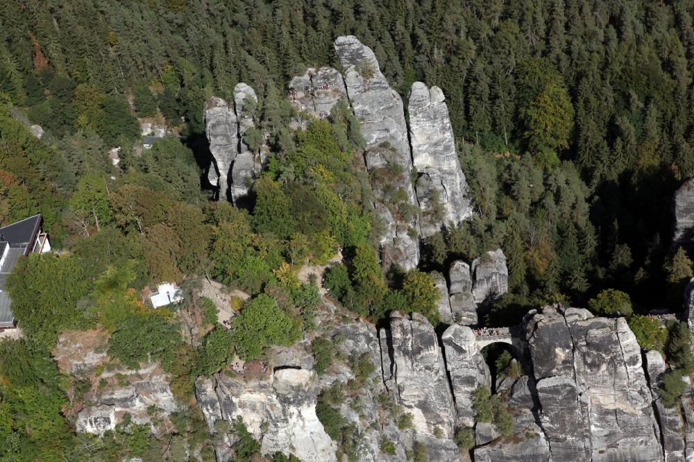 Rathen from above - Bridge construction of the Bastei Bridge in Rathen in the state Saxony. The Bastei is a rock formation with a viewing platform in Saxon Switzerland on the right bank of the Elbe in the area of the municipality of Lohmen between the health resort Rathen and the city of Wehlen