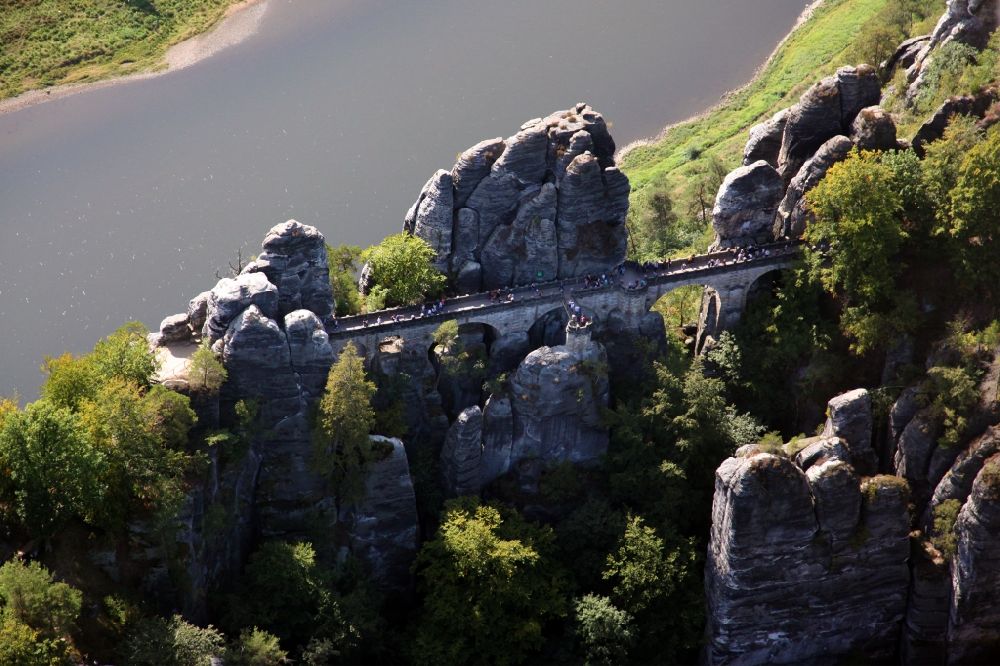 Rathen from the bird's eye view: Bridge construction of the Bastei Bridge in Rathen in the state Saxony. The Bastei is a rock formation with a viewing platform in Saxon Switzerland on the right bank of the Elbe in the area of the municipality of Lohmen between the health resort Rathen and the city of Wehlen
