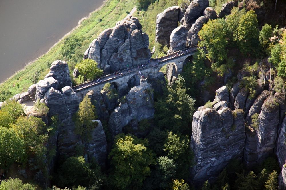Aerial image Rathen - Bridge construction of the Bastei Bridge in Rathen in the state Saxony. The Bastei is a rock formation with a viewing platform in Saxon Switzerland on the right bank of the Elbe in the area of the municipality of Lohmen between the health resort Rathen and the city of Wehlen