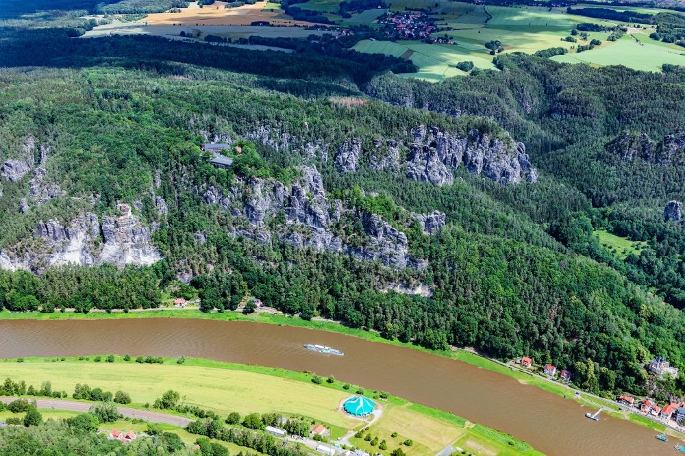 Aerial photograph Lohmen - Bridge construction of the Bastei Bridge in Rathen in the state Saxony. The Bastei is a rock formation with a viewing platform in Saxon Switzerland on the right bank of the Elbe in the area of the municipality of Lohmen between the health resort Rathen and the city of Wehlen