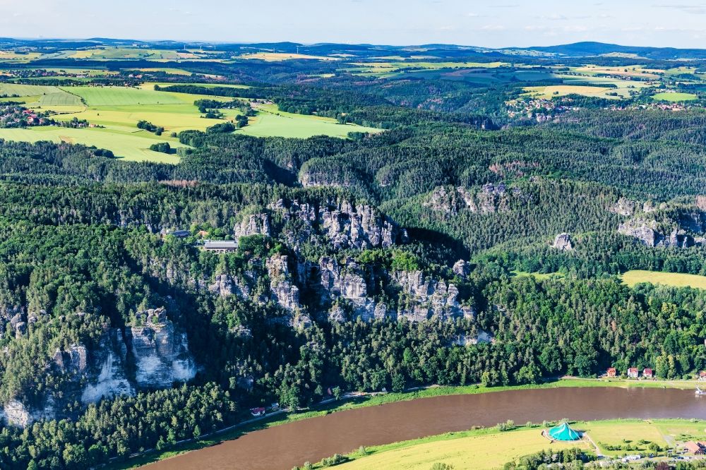 Lohmen from above - Bridge construction of the Bastei Bridge in Rathen in the state Saxony. The Bastei is a rock formation with a viewing platform in Saxon Switzerland on the right bank of the Elbe in the area of the municipality of Lohmen between the health resort Rathen and the city of Wehlen