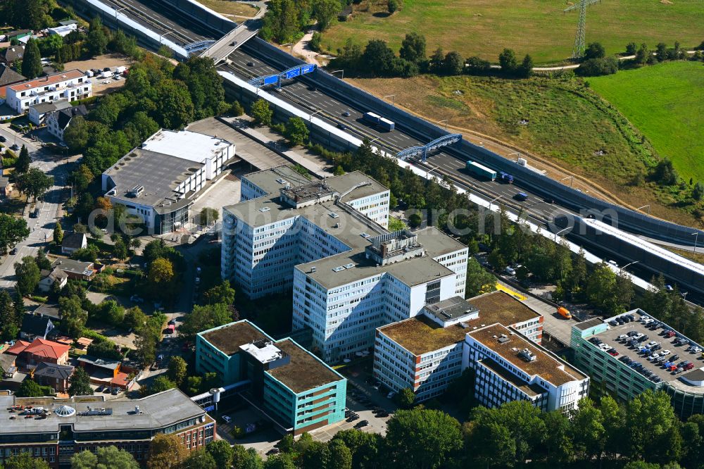 Aerial photograph Hamburg - Office and commercial building ensemble and the Hamburg-Schnelsen exhibition hall on Modering on the BAB A7 freeway in the Schnelsen district in Hamburg, Germany
