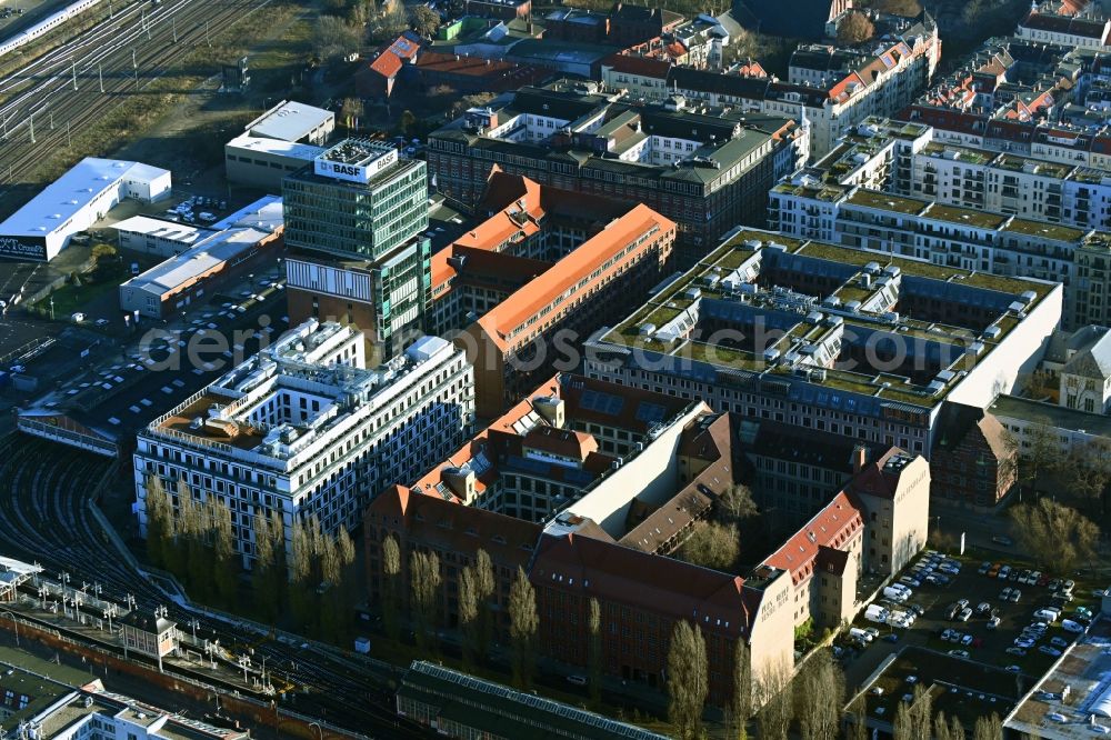 Aerial image Berlin - Construction site on building of the monument protected former Osram respectively Narva company premises Oberbaum City in the district Friedrichshain in Berlin. Here, among many other companies, BASF Services Europe, the German Post Customer Service Center GmbH and Heineken Germany GmbH are located