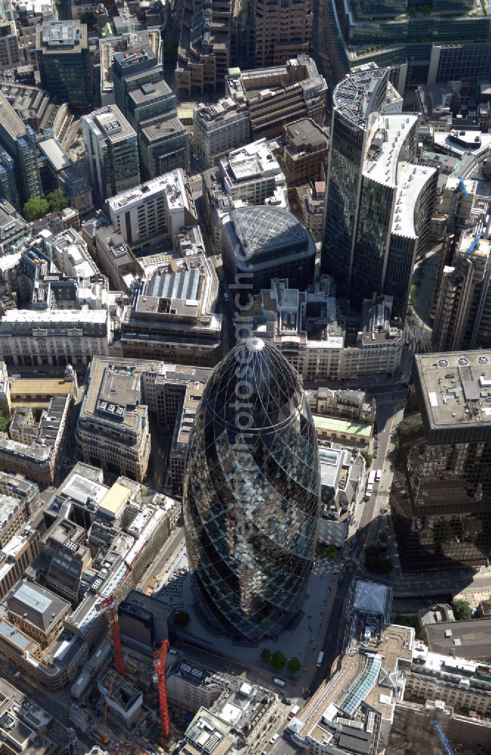 Aerial image London - Office and corporate management high-rise building The Gherkin on street Saint Mary Axe in London in England, United Kingdom