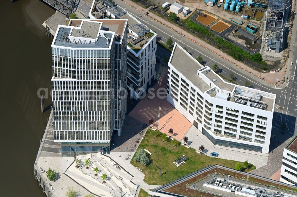 Aerial photograph Hamburg - Administrative and commercial buildings on Ueberseeallee in the district HafenCity in Hamburg, Germany