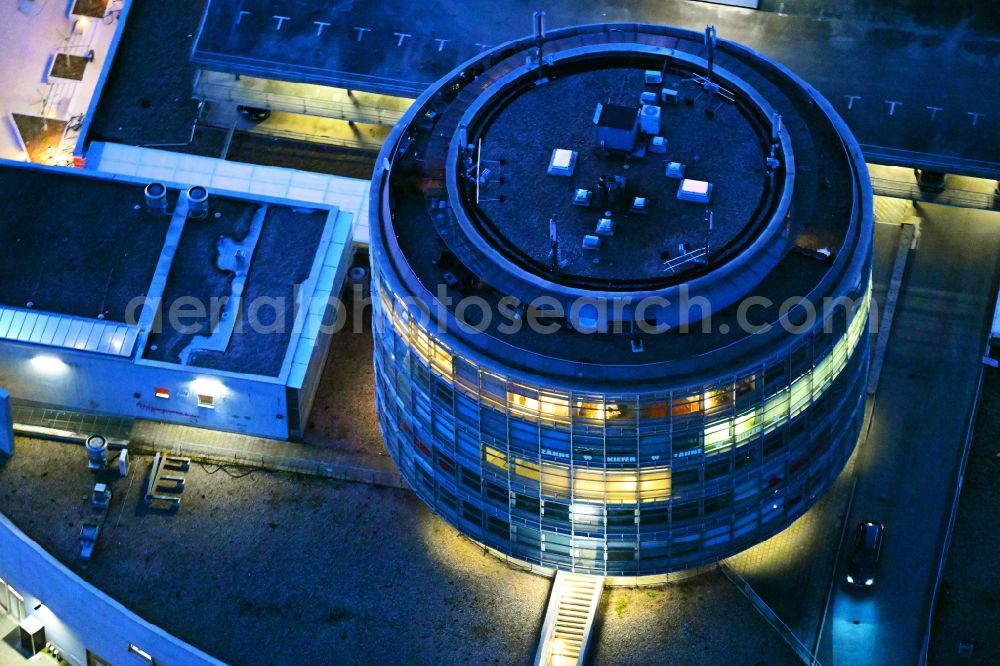 Aerial photograph Bernau - Office building of the administration and commercial building on the EKZ shopping center Bahnhofs-Passage on the street Boernicker Chaussee in Bernau in the state Brandenburg, Germany