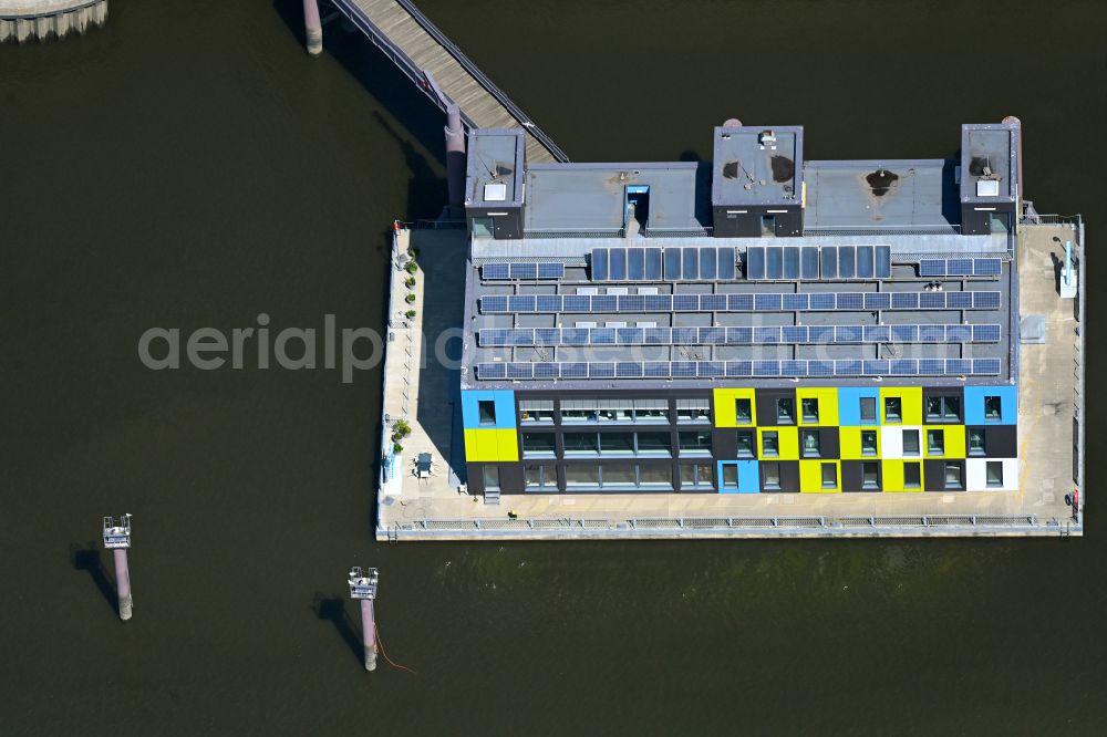 Aerial image Hamburg - Office building of the administration and commercial building on the bank of the river course of the Elbe on the street Am Zollhafen in the district Veddel in Hamburg, Germany