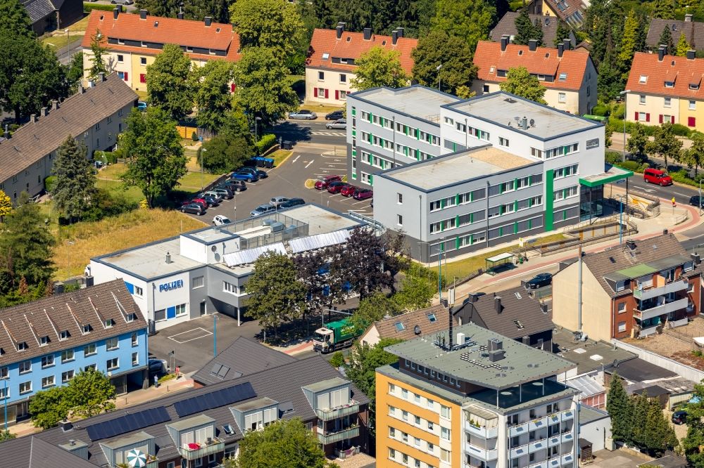 Velbert from the bird's eye view: Office building jobcenter ME-aktiv Velbert and the local police station on Heiligenhauser Strasse in Velbert in the state North Rhine-Westphalia, Germany