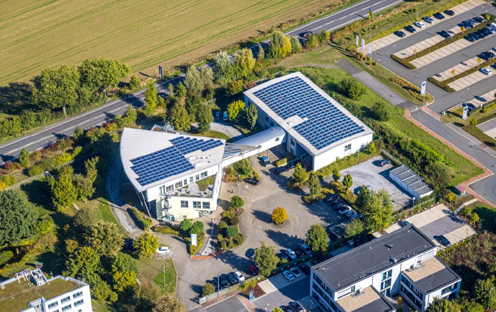 Aerial image Unna - Photovoltaic system on the roof of the office building of the administration and commercial building of PVS Westfalen -Sued rkV on Heinrich-Hertz-Strasse in the district of Uelzen in Unna in the Ruhr area in the state North Rhine-Westphalia, Germany