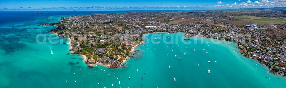 Grand Baie from the bird's eye view: Water surface at the bay along the sea coast Grand Bay in Grand Baie in Riviere du Rempart, Mauritius