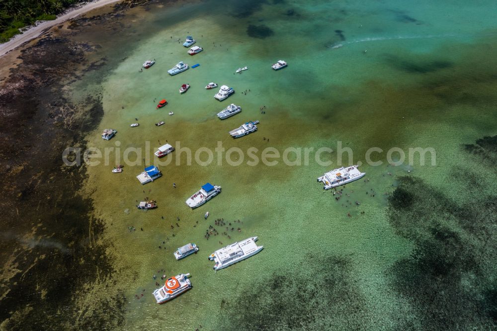 Punta Cana from the bird's eye view: Water surface at the bay along the sea coast Natural Pool in Punta Cana in La Altagracia, Dominican Republic