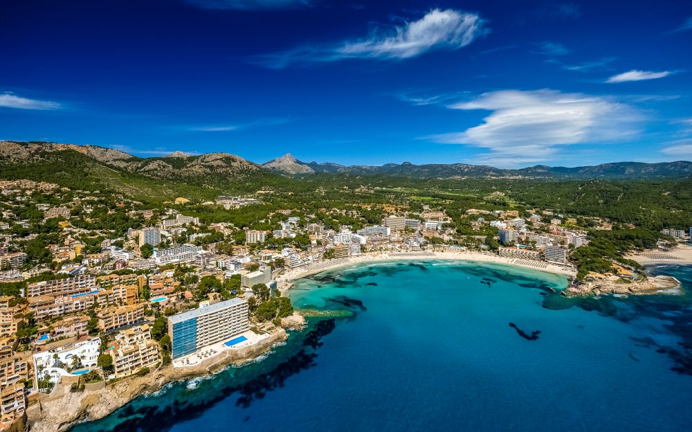Aerial photograph Peguera - Water surface at the bay along the sea coast in Peguera in Balearic island of Mallorca, Spain