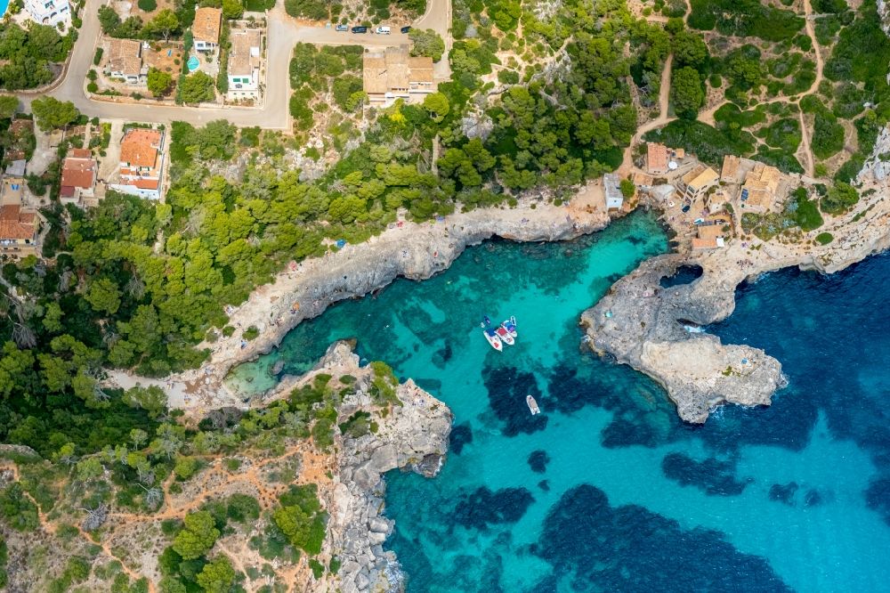 Aerial photograph Santanyi - Water surface at the bay along the sea coast S'almunia playa in Santanyi in Balearische Insel Mallorca, Spain