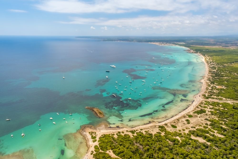 Campos from above - Water surface at the bay along the sea coast of Strands Platja of Trenc in Campos in Islas Baleares, Spain