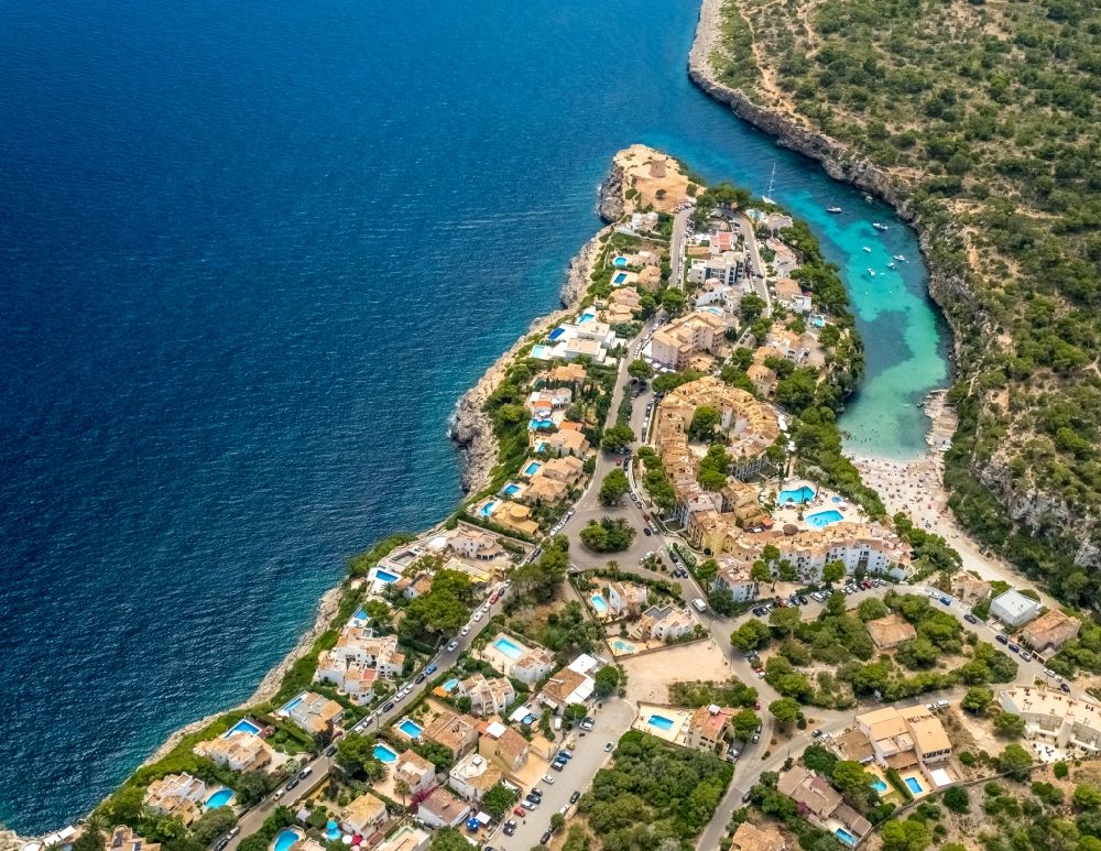 Aerial image Cala Pi - Water surface at the bay along the sea coast Torre de Cala Pi in Cala Pi in Balearische Insel Mallorca, Spain