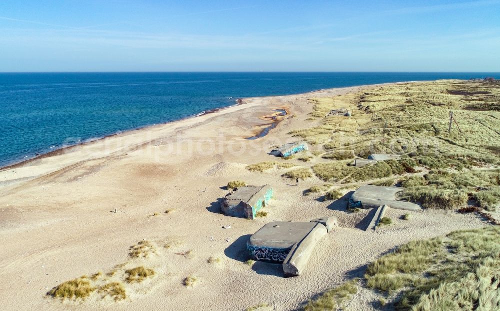 Thisted from the bird's eye view: Bunker building complex made of concrete and steel on the sandy beach of the North Sea in Klitmoller in Nordjylland, Denmark