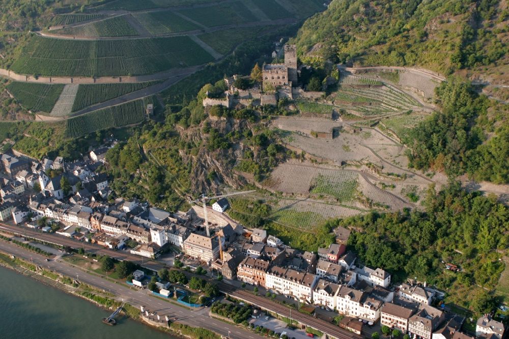 Kaub from above - Castle Gutenfels on cultivation fields on a mountain at the riverside of the Rhine in Kaub in Rhineland-Palatinate. The castle is part of the UNESCO World Heritage List