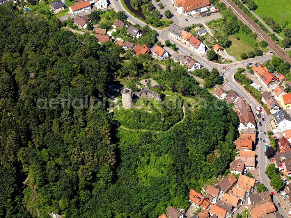 Hausach from above - Fortress Husen in the Kinzig Valley in Hausach in the state of Baden-Württemberg. The ruins and remains of the castle are located above the town in the valley of the river Kinzig in the Black Forest. The original high fortress has been on site since the 12th century. The fortress is owned by the town. The castle keep, tower and parts of the walls have been preserved