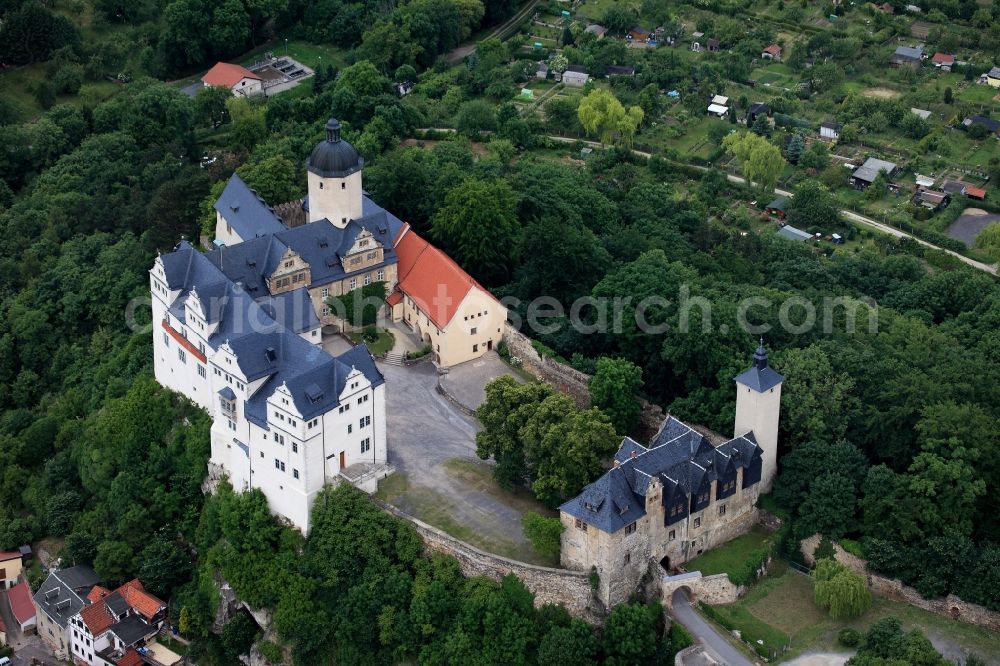 Aerial image Ranis - Castle Ranis in Ranis in the state of Thuringia. The high fortress above the town of Ranis consists of a small main castle, a courtyard, a round castle keep, the elaborate South wing and two outer baileys. The compound can be dated to the 12th century. In the 17th century the fortress was refurbished and rebuilt as a palace-like castle. Today it is home to the homeland museum