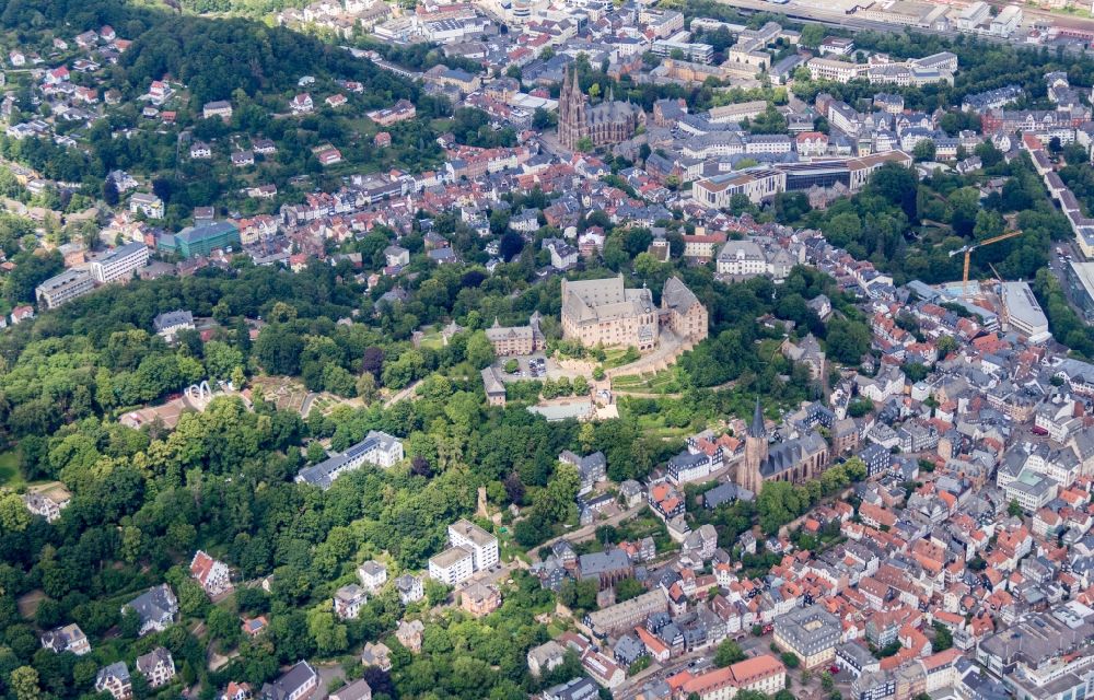 Marburg from above - Castle of Landgrafenschloss with museum overlooking the church building of the Lutherische Pfarrkirchengemeinde St. Marien in Marburg in the state Hesse, Germany