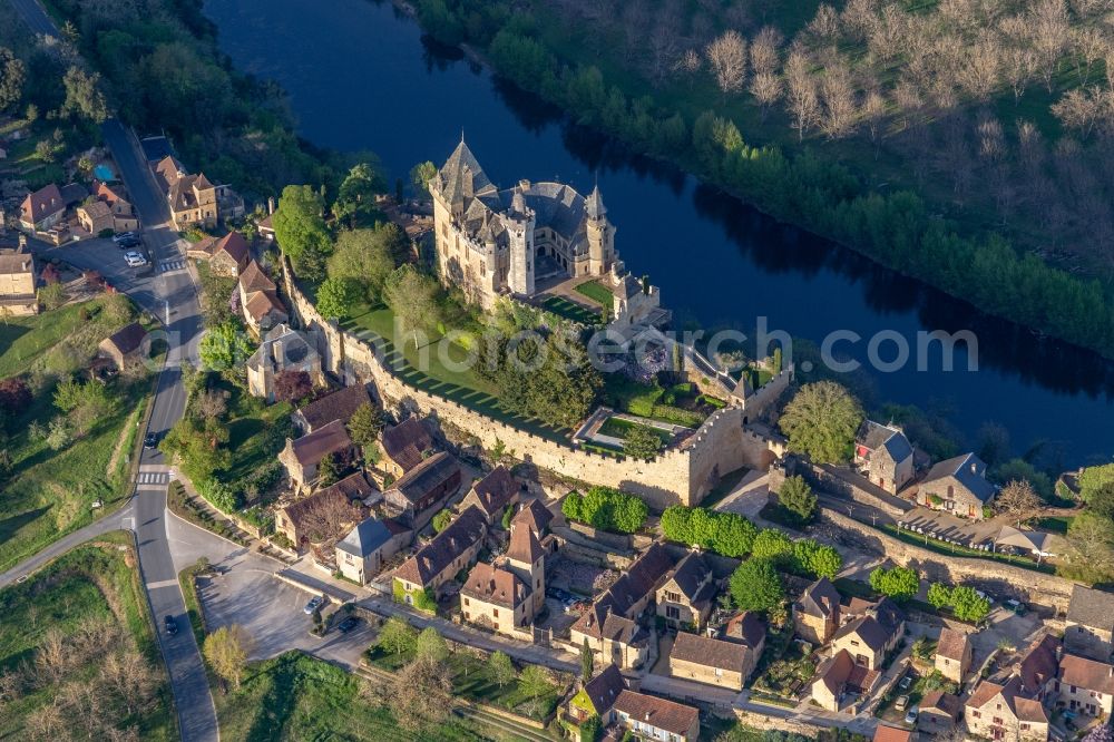 Vitrac from the bird's eye view: Castle of Montfort above the Dordogne in Vitrac in Nouvelle-Aquitaine, France
