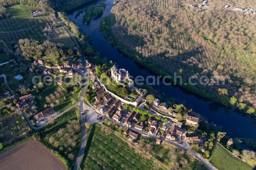 Vitrac from the bird's eye view: Castle of Montfort above the Dordogne in Vitrac in Nouvelle-Aquitaine, France