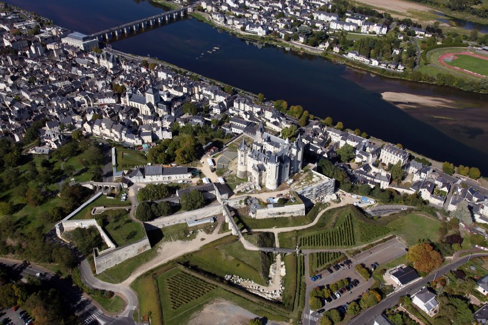 Saumur from the bird's eye view: Castle of Chateau Saumur in Saumur in Pays de la Loire, France. The castle is surrounded by bastions