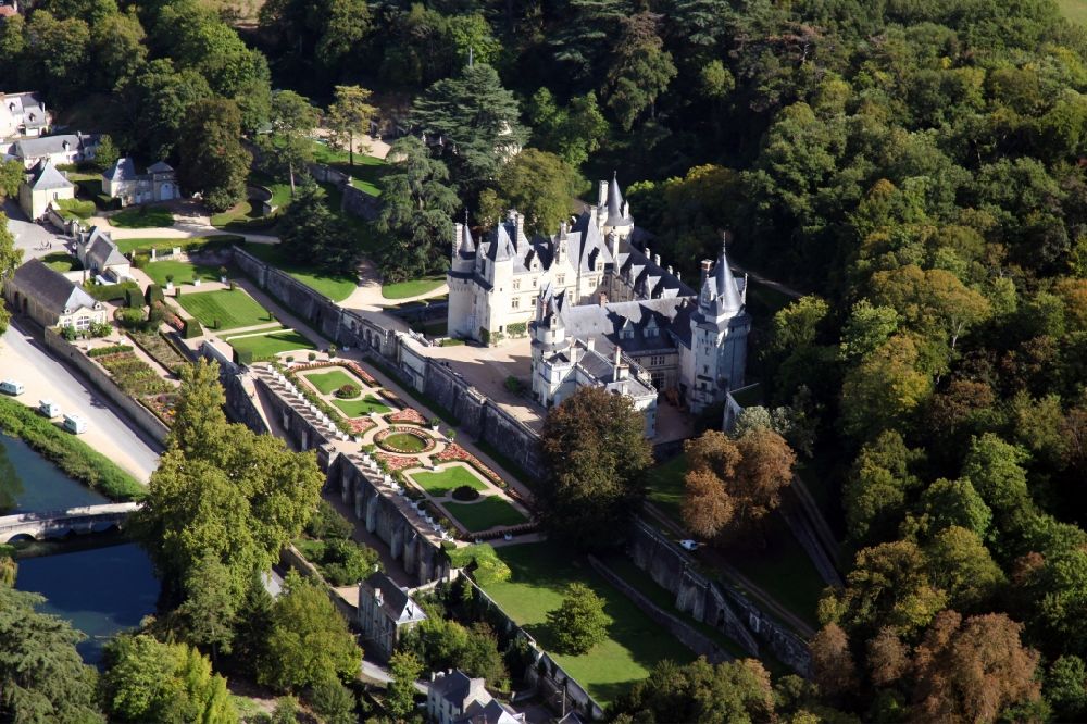 Aerial photograph Rigny Usse - Castle Chateau d' Usse in Rigny Usse in Centre-Val de Loire, France. The present castle dates back to a medieval castle, on the foundations of which a new plant was built and extended later. After further changes, Schloss Usse today presents itself as the epitome of a romantic fairytale castle. It is classified as a historic Monument