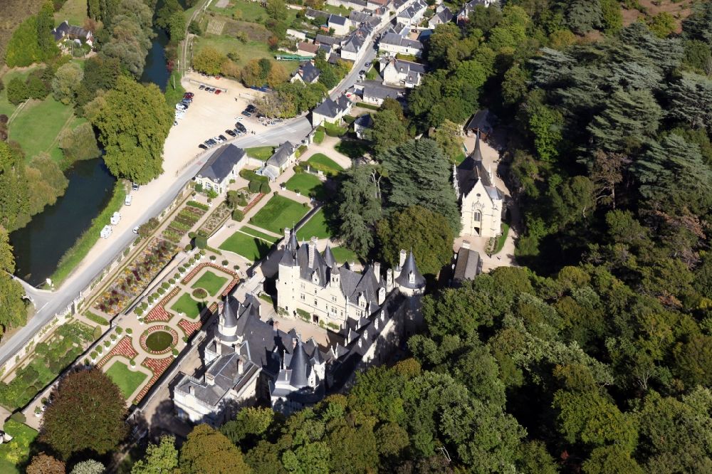 Aerial image Rigny Usse - Castle Chateau d' Usse in Rigny Usse in Centre-Val de Loire, France. The present castle dates back to a medieval castle, on the foundations of which a new plant was built and extended later. After further changes, Schloss Usse today presents itself as the epitome of a romantic fairytale castle. It is classified as a historic Monument. The castle chapel (on the right) is consecrated to Saint Anna and was once a collegiate church