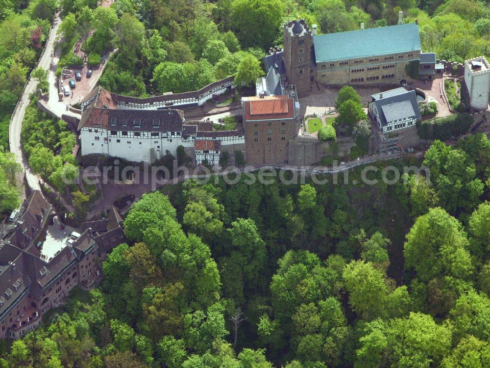 Eisenach from the bird's eye view: Castle of the fortress Wartburg-Stiftung Eisenach in Eisenach in the Thuringian Forest in the state Thuringia, Germany