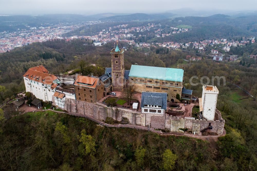 Eisenach from the bird's eye view: Castle of the fortress Wartburg-Stiftung Eisenach in Eisenach in the state Thuringia, Germany