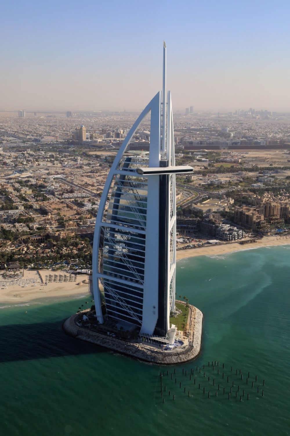 Aerial photograph Dubai - Burj Al Arab is landmark and symbol of Dubai in United Arab Emirates