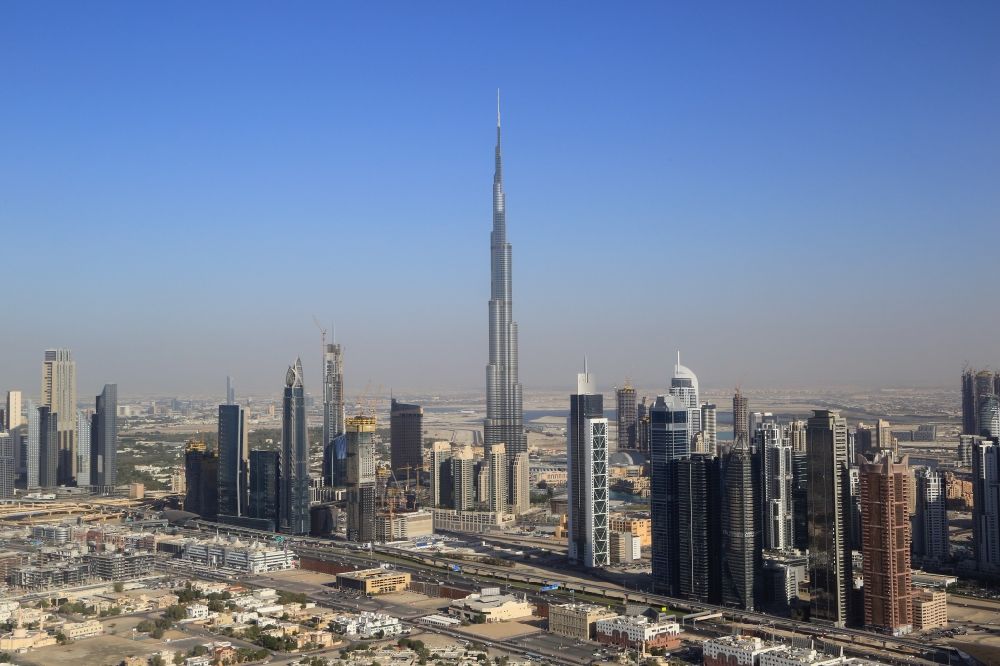 Aerial photograph Dubai - Burj Khalifa ( Khalifa Tower ) is uprising landmark and symbol of Dubai in United Arab Emirates