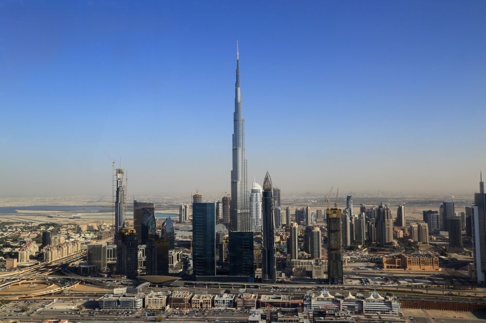 Dubai from above - Burj Khalifa ( Khalifa Tower ) is uprising landmark and symbol of Dubai in United Arab Emirates