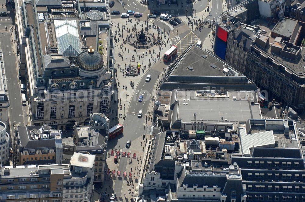 Aerial photograph London - View at Burlington House, the London Pavilion Mall and Piccadilly Circus with the Shaftesbury Memorial Fountain in the district City of Westminster in London in the United Kingdom. Burlington House is home to the Royal Academy of Artsas well as the scientific institutions Geological Society of London, Linnan Society, Royal Astronomical Society, Society of Antiquaries of London and the Royal Society of Chemistry. Piccadilly Circus is one of the main transport hubs in London