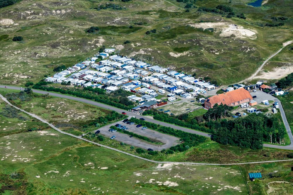 Norderney from the bird's eye view: Campsite with caravans and tents in the coastal area Eiland Klaus Harms in Norderney in the state Lower Saxony, Germany