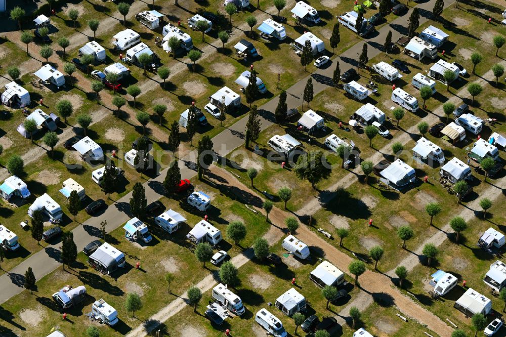 Zingst from the bird's eye view: Campsite with caravans and tents in the coastal area Wellness-Camp Duene 6 on street Inselweg in Zingst at the baltic sea coast in the state Mecklenburg - Western Pomerania, Germany