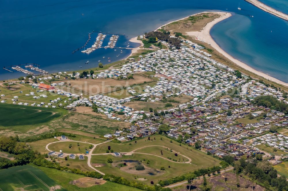 Aerial photograph Neukirchen - Campsite with caravans and tents at the shores of the Baltic Sea on street Seekamp-Strand in Neukirchen in the state Schleswig-Holstein, Germany