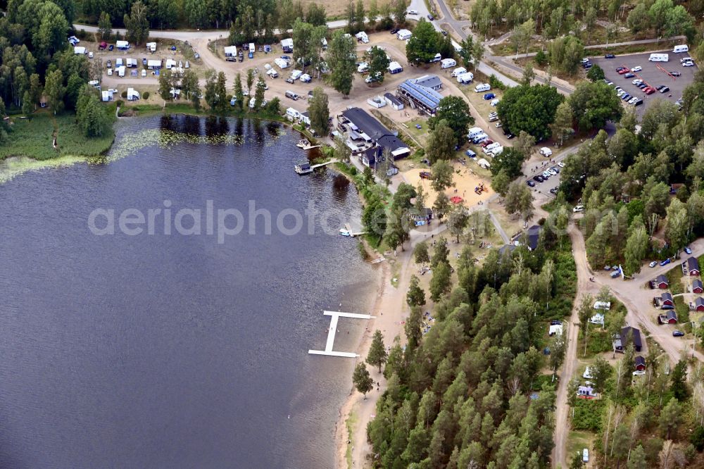 Vimmerby from above - Campsite with caravans and tents on the lake shore Vimmerby Camping Nossenbaden in Vimmerby in Kalmar laen, Sweden