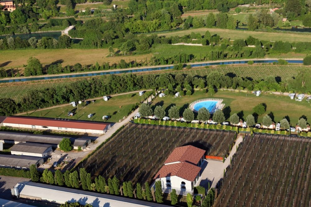 Aerial image Valeggio sul Mincio - Camping with caravans and tents in the district Monte Borghetto in Valeggio sul Mincio in Veneto, Italy