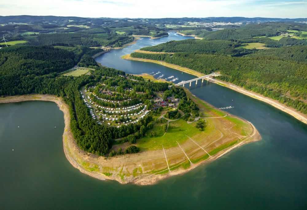 Olpe from above - Camp site Campingplatz Biggesee GmbH with caravans and tents at the Bigge with low water stand in Olpe in the state North Rhine-Westphalia