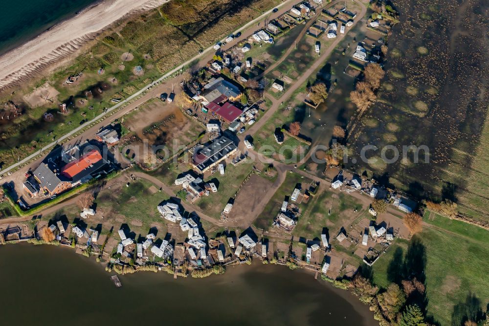 Westerholz from the bird's eye view: Storm and flood damage on the campsite with caravans and tents on the Baltic Sea beach in Langballigholz in the state of Schleswig-Holstein