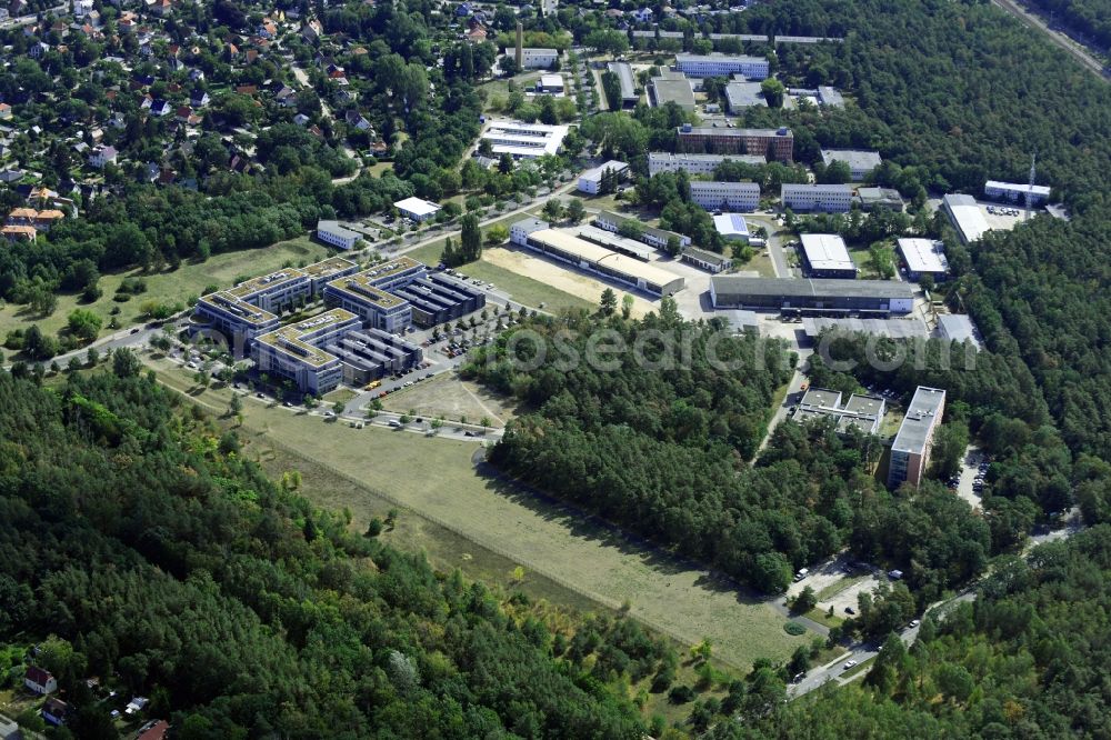 Aerial photograph Berlin - View of clouds surrounding the campus of commercial area Wuhlheide Innovation Park in Berlin - Koepenick