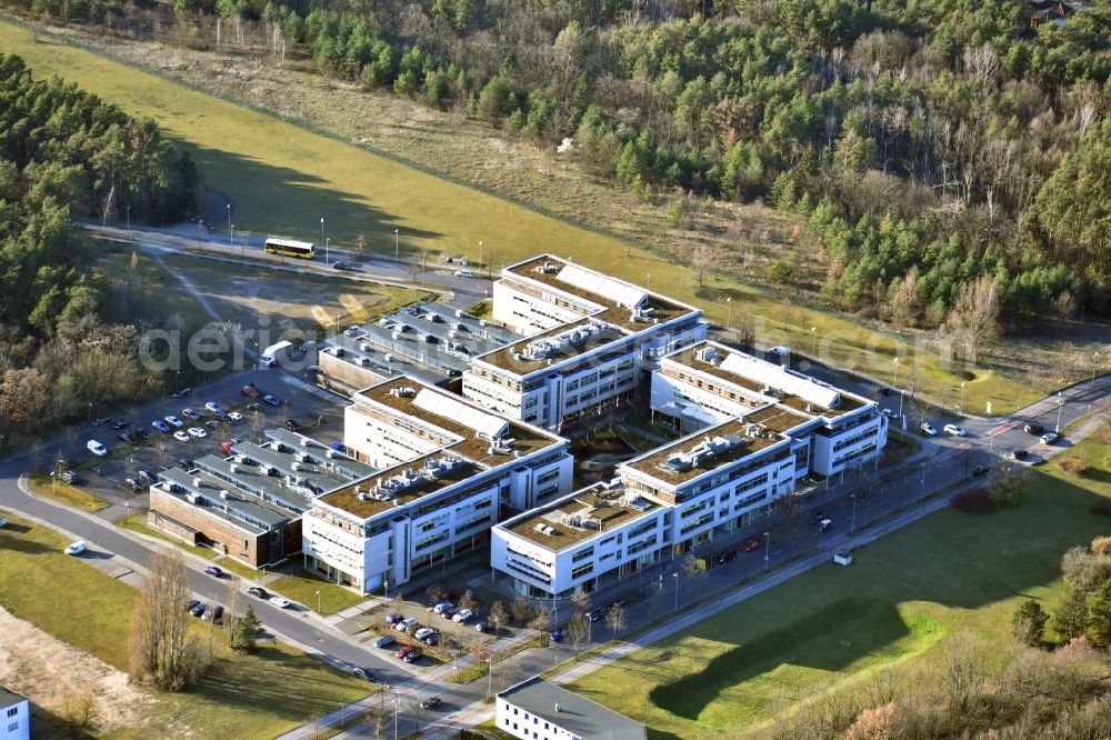Aerial image Berlin - View of clouds surrounding the campus of commercial area Wuhlheide Innovation Park in Berlin - Koepenick