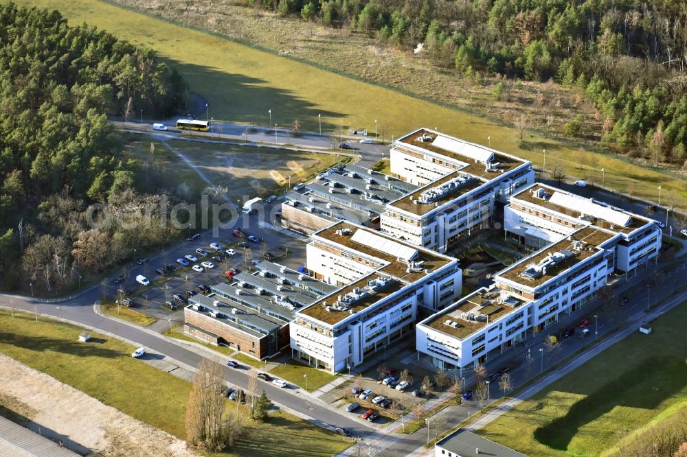Aerial photograph Berlin - View of clouds surrounding the campus of commercial area Wuhlheide Innovation Park in Berlin - Koepenick